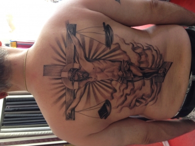 Tatuaggi tattoo La crocifissione di Dio 